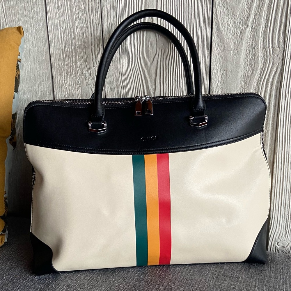 Cluci cream & black with racer stripe laptop tote bag. So many compliments.